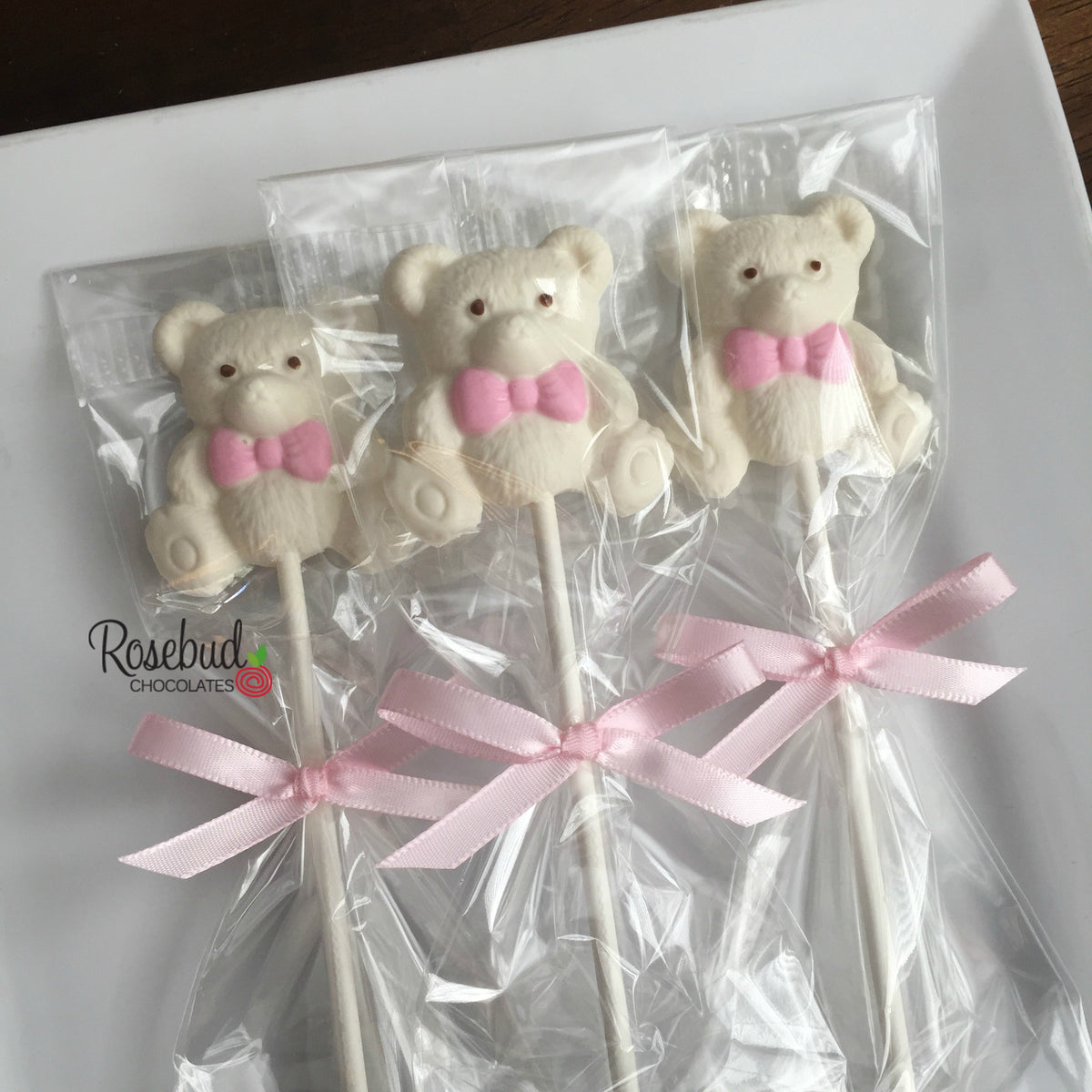It's A Girl white chocolate lollipops Pink Baby Shower Candy Favors  www.rosebudchocolates.…